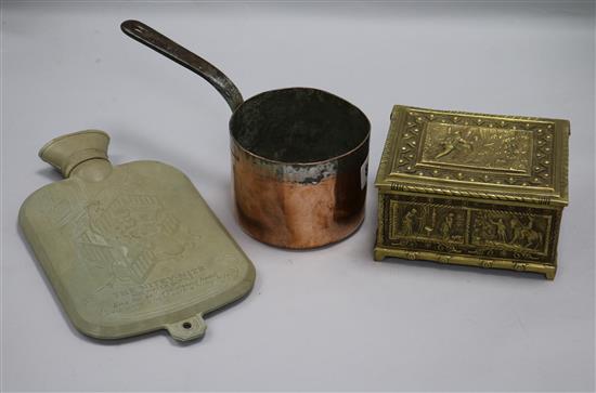 An early childs hot water bottle cover, saucepan and brass box